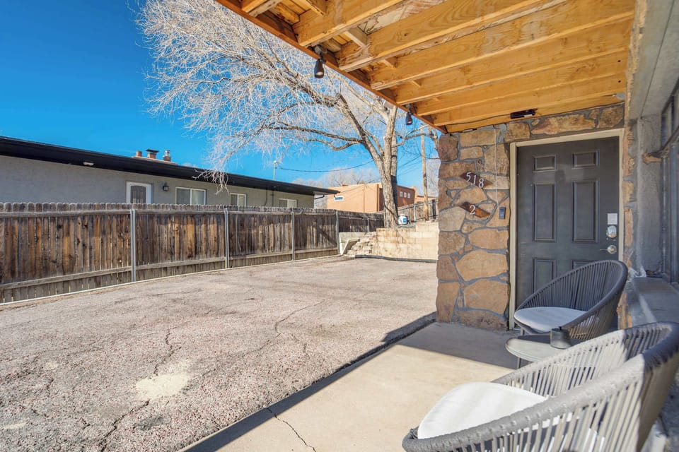 Private entrance to the lower-level unit, located on the ground floor of the duplex. This listing is for the lower unit only and does not include the upper unit.