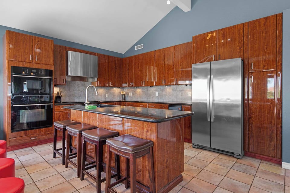 Bar seating at the island and a double oven for big dinners