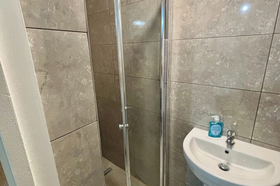 Shower , Toilet and hand wash sink