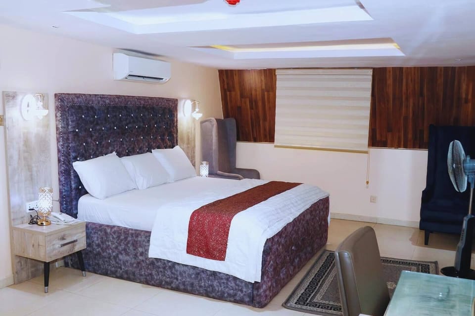 Deluxe Room, Balcony, City View | Desk, laptop workspace, blackout drapes, soundproofing
