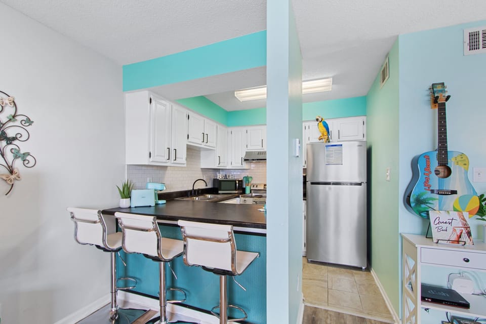 Signature Condo, 1 Bedroom, Balcony, Beach View | Private kitchen | Fridge, microwave, oven, stovetop