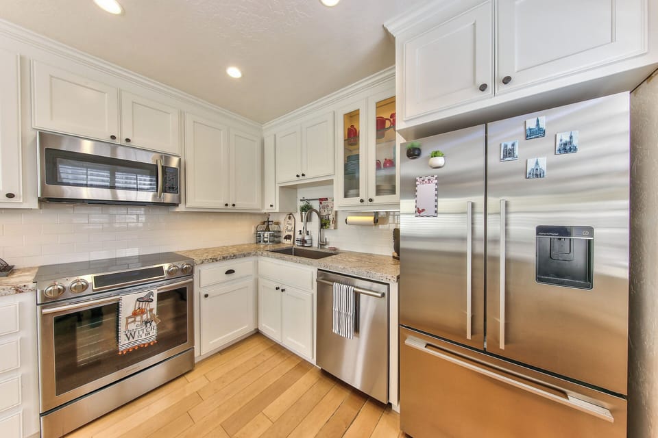 Immaculate Kitchen with Stainless Steel Appliances