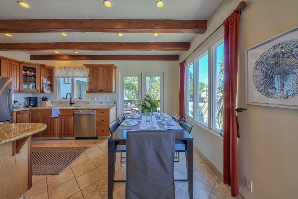 Dining Table and Attractive Fully-Equipped Kitchen
