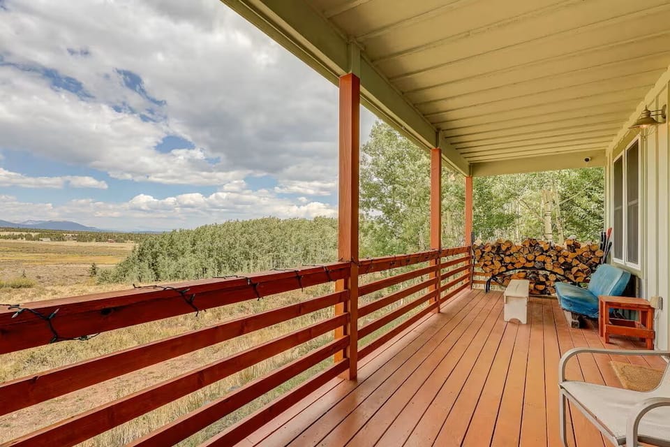 Front Porch - Covered front porch with stunning mountain valley views and comfortable seating - the perfect spot to unwind and take in the Colorado scenery.