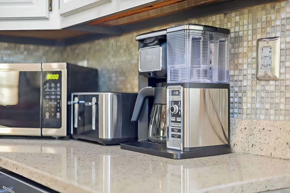 Fuel up for the day at the fully stocked coffee station.