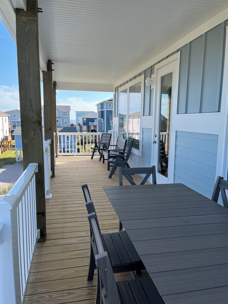 Listen to the ocean waves from our outdoor dining table for 8 and seating for 4