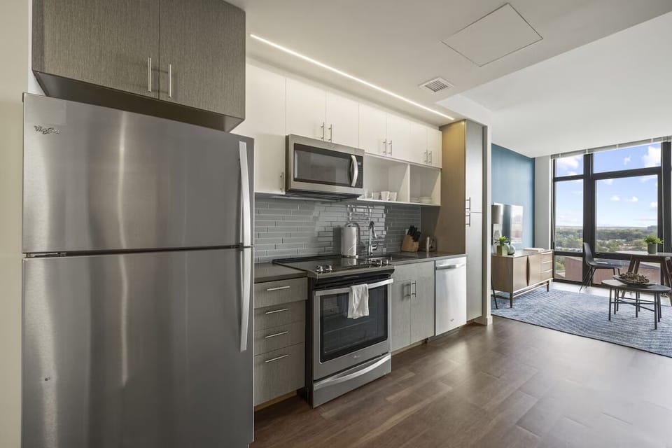 Cook with ease in the modern kitchen with stainless appliances.