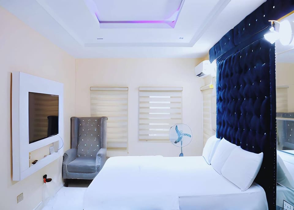 Family Room, Balcony, City View | Desk, laptop workspace, blackout drapes, soundproofing