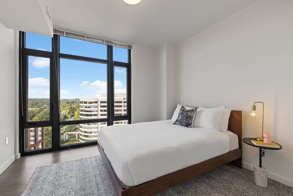 Wake up to sweeping views from crisp, cloud-soft bedding.