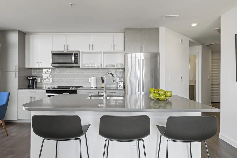 Cook with ease in the bright, fully equipped stainless kitchen.