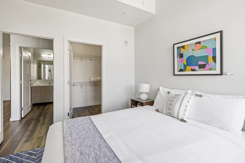 Stretch out comfortably in a bright room with corner views.