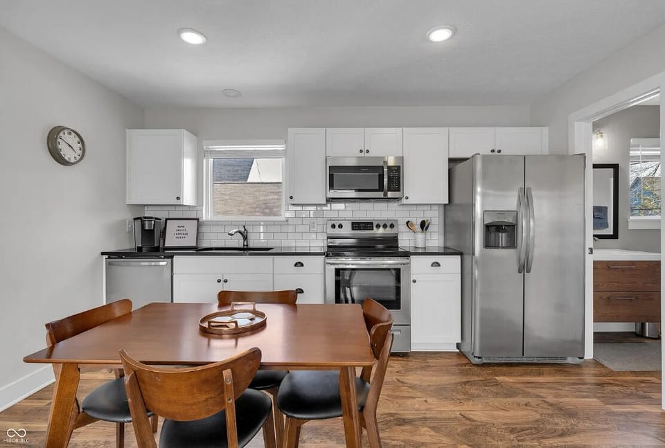 Hardwood table seats 4. Full fridge.