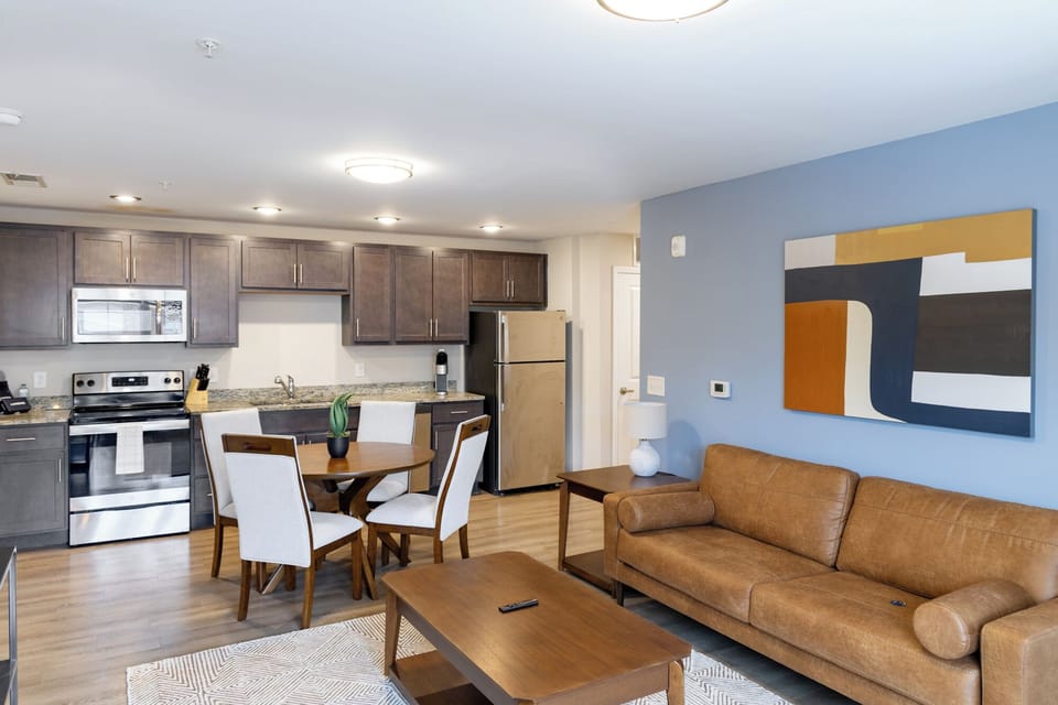 Apartment (2 Bedrooms) | Living area | 50-inch TV with digital channels, foosball