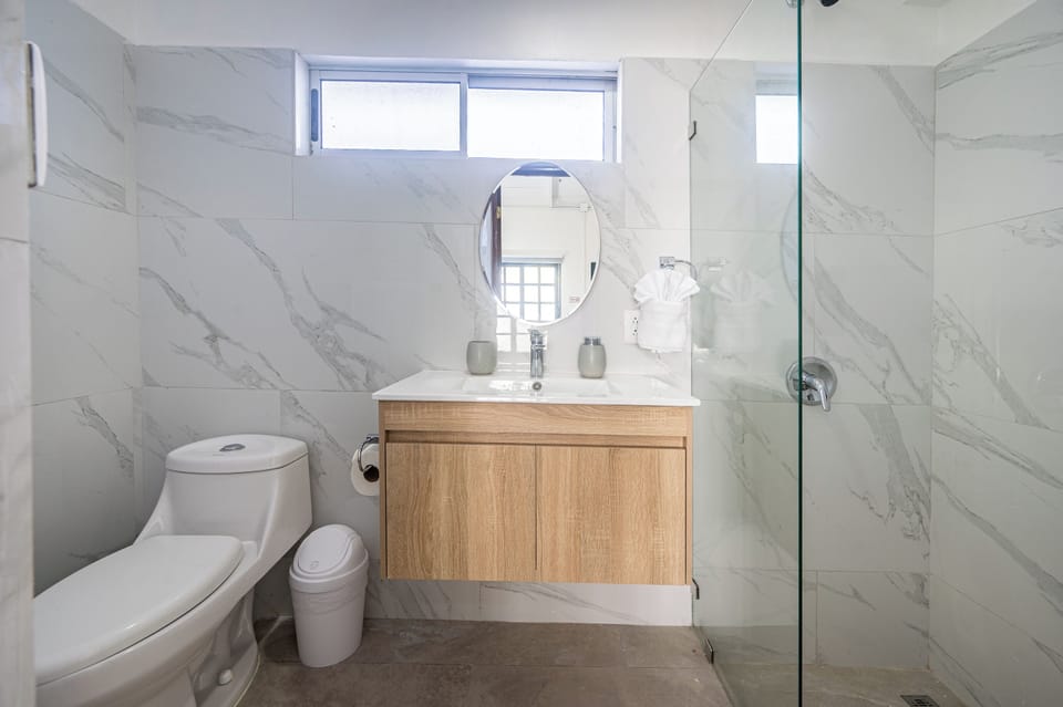 Standard Room, Garden View | Bathroom | Shower, towels, soap, shampoo