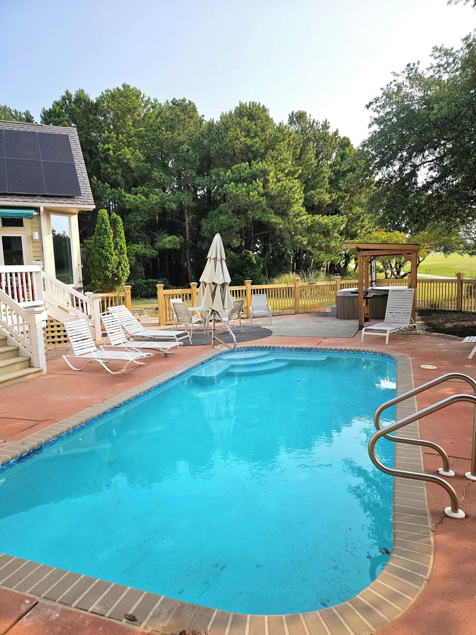 Pool resurfaced in 2025, new gazebo, tons of seating, and solar on the roof!