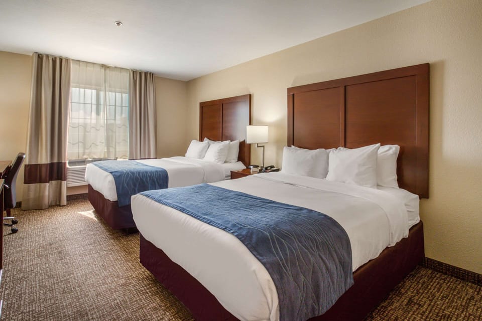 Premium bedding, desk, blackout drapes, iron/ironing board