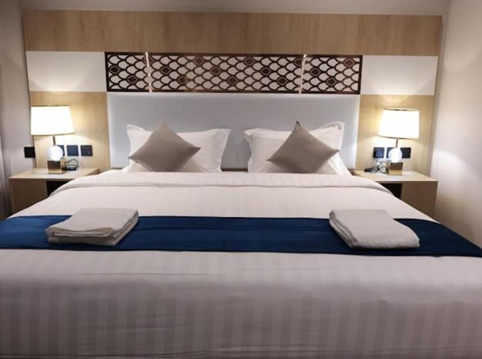Premium bedding, memory foam beds, minibar, in-room safe