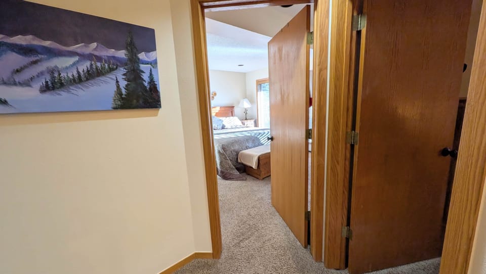 Hallway into Primary and Secondary Bedrooms