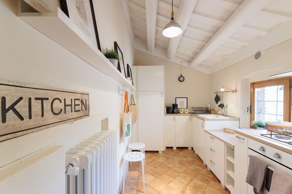 Apartment (2 Bedrooms) | Private kitchen | Fridge, oven, stovetop, highchair