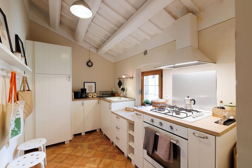 Apartment (2 Bedrooms) | Private kitchen | Fridge, oven, stovetop, highchair