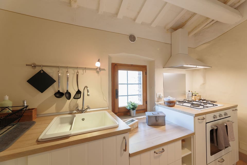 Apartment (2 Bedrooms) | Private kitchen | Fridge, oven, stovetop, highchair