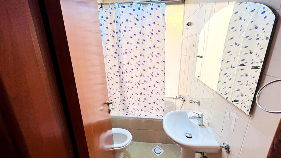 Economy Double Room, Balcony, City View | Shared bathroom