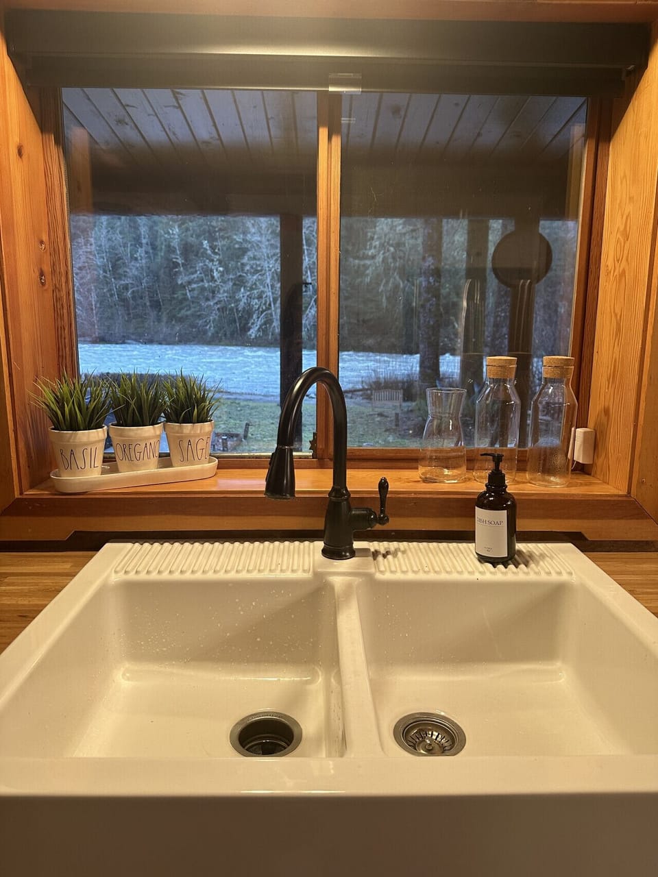 The View: Enjoy peaceful river views while you prep. Our farmhouse sink overlooks the water, making even dish duty feel like a getaway.