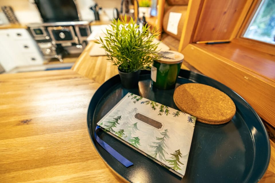 Thoughtful, nature-inspired design in every corner. This kitchen nook features local touches that celebrate the spirit of the Pacific Northwest. It’s the perfect spot to jot down a memory in the guest book or plan your next day of exploring.
