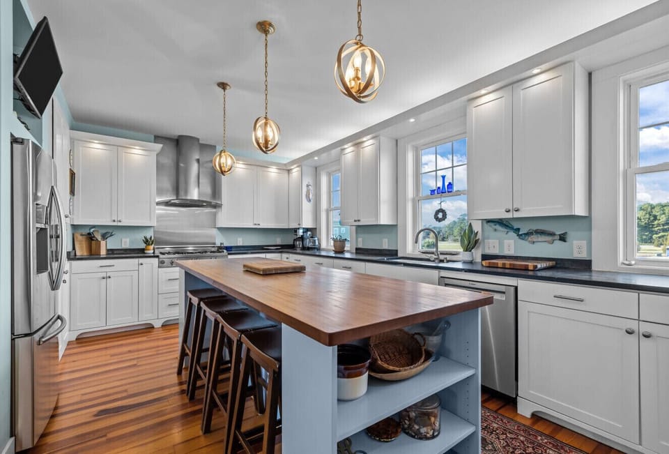 Expansive gourmet kitchen with premium appliances and thoughtful amenities