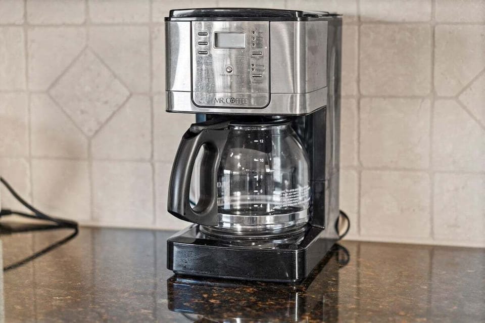 Coffee station with drip coffee maker—perfect for morning coffee before heading to the beach.