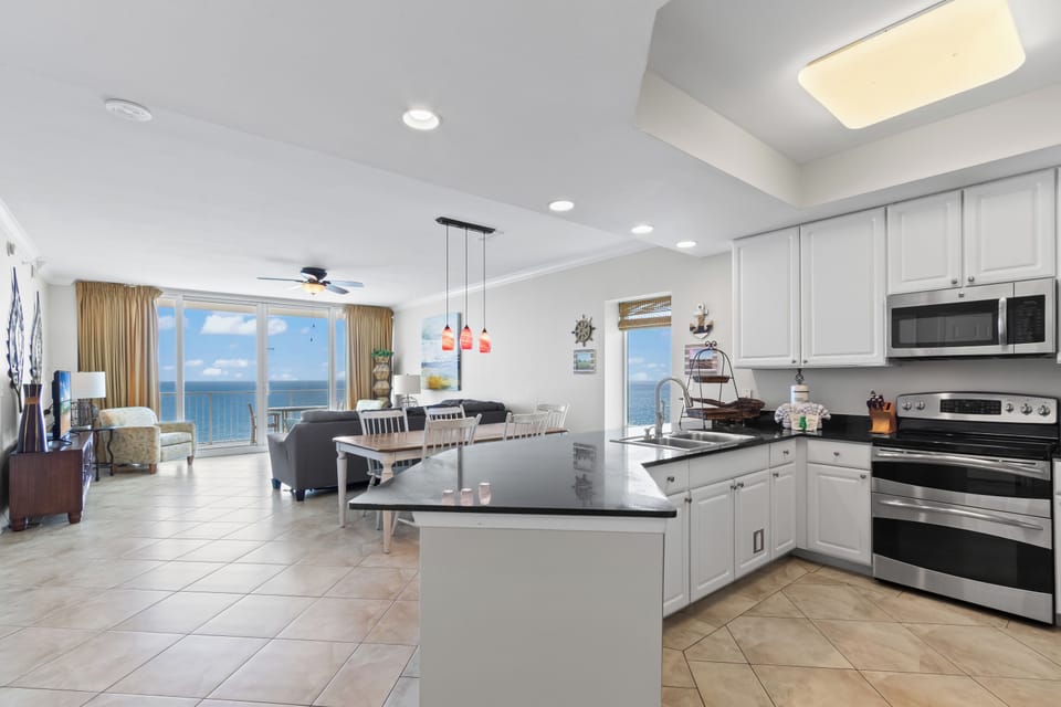 Executive Condo, 3 Bedrooms, Balcony, Beach View | Private kitchen | Fridge, microwave, oven, stovetop