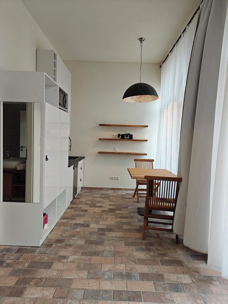 Luxury Studio Suite, Garden View | Private kitchen | Coffee/tea maker, highchair
