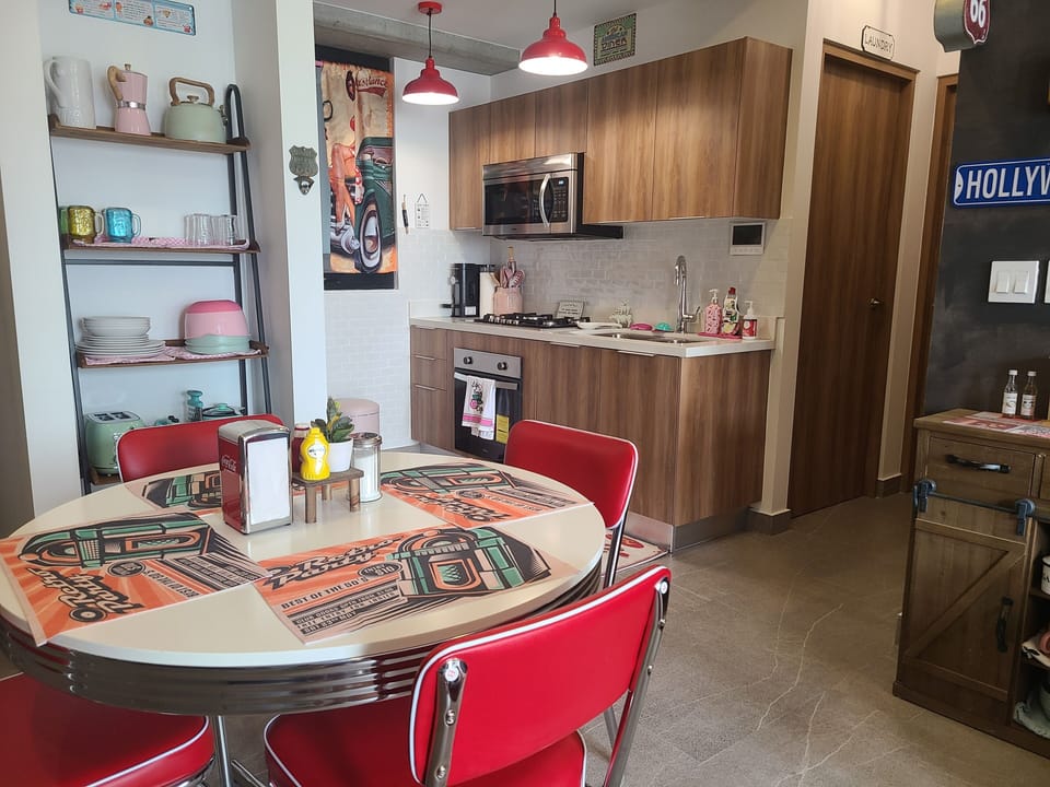 50's nostalgia unique decor. Dining room seats 4 persons comfortably. 