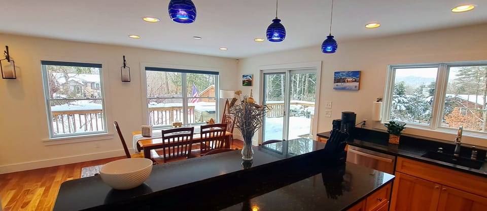 Open kitchen with island facing dining room