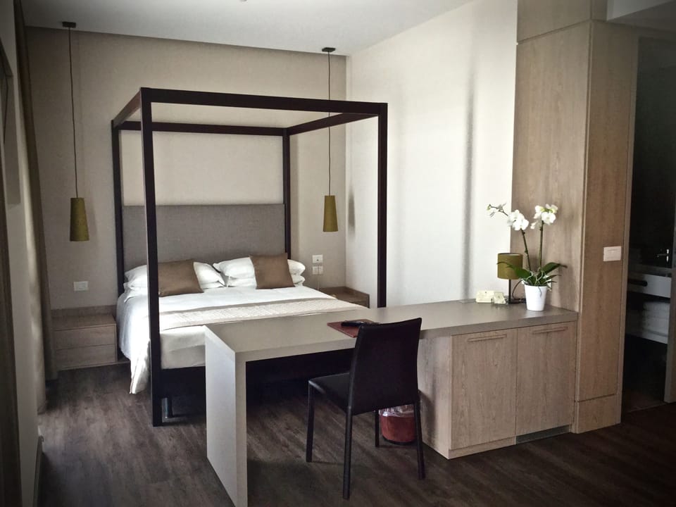 Premium Quadruple Room | In-room safe, desk, bed sheets