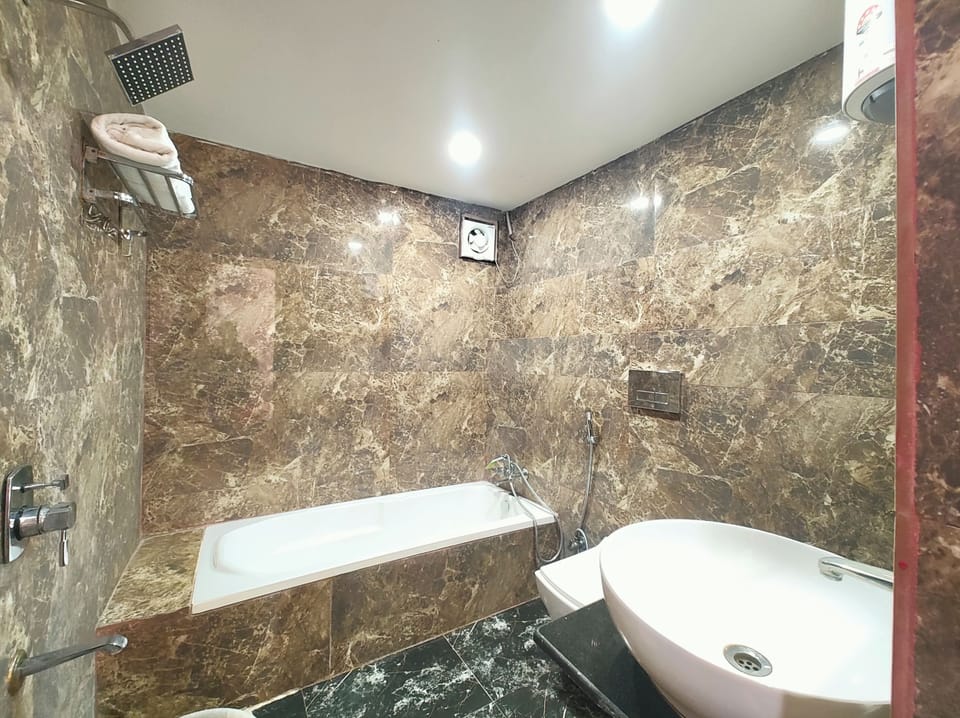 Family Double Room, Air conditioning | Bathroom | Shower, rainfall showerhead, slippers, towels