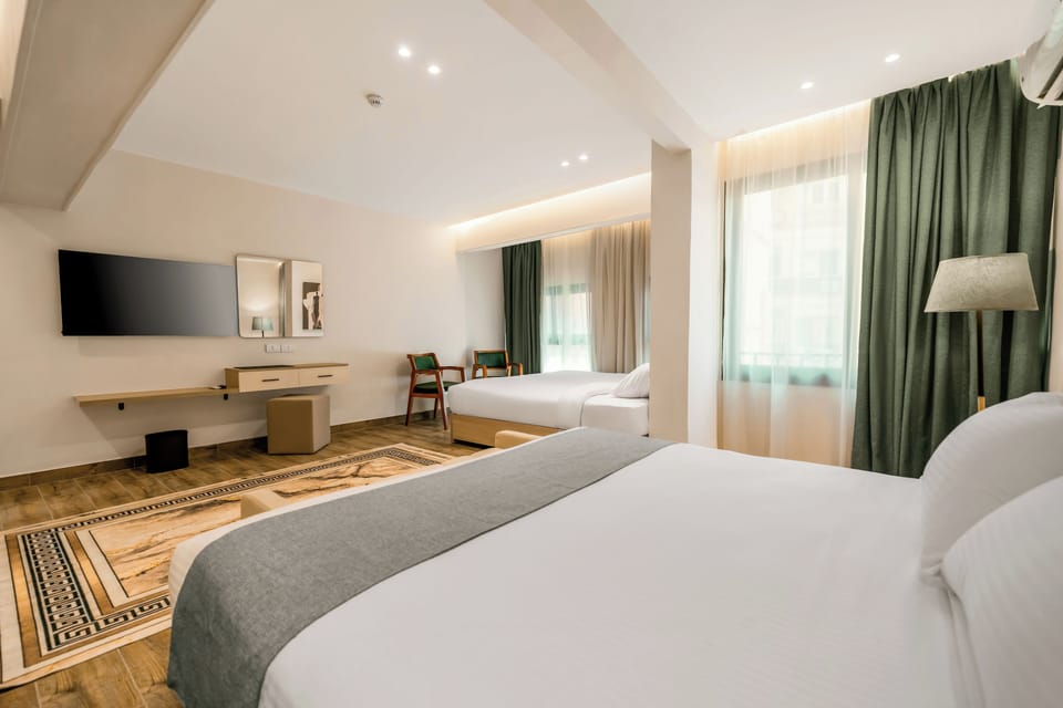 Family Suite, City View | In-room safe, blackout drapes, iron/ironing board, free WiFi