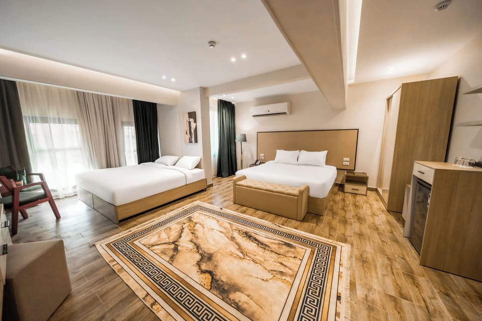 Family Suite, City View | In-room safe, blackout drapes, iron/ironing board, free WiFi