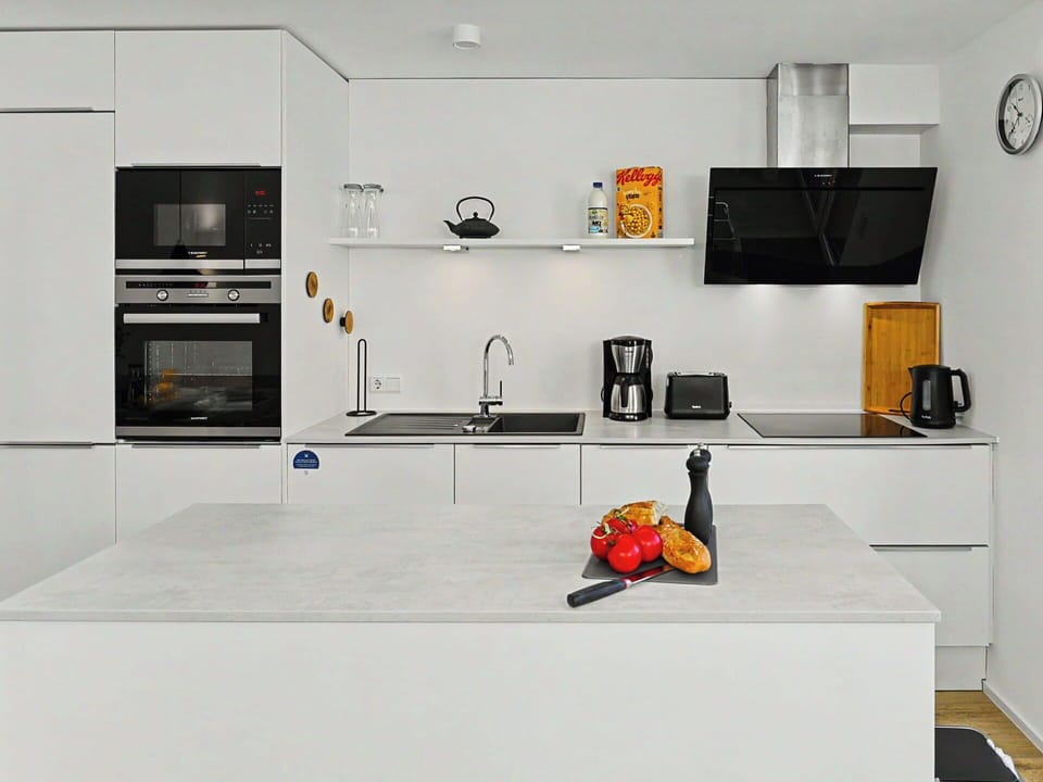 Kitchen, Kitchen Appliance, Countertop, Flooring, Furniture, Major Appliance, Cabinetry, Interior Design, Wood, Home Appliance