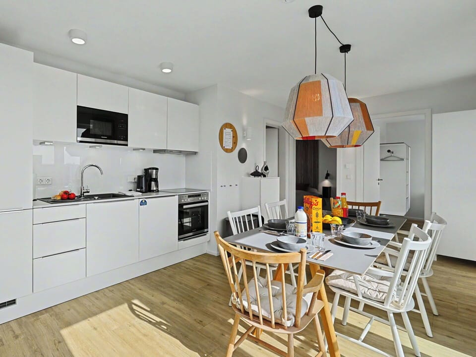 Furniture, Interior Design, Flooring, Wood, Kitchen, Floor, Ceiling, Light Fixture, Room, Chair