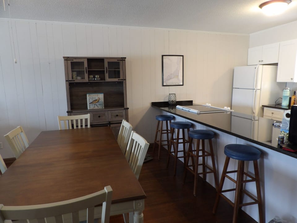 Dining seating for eight plus bar stools