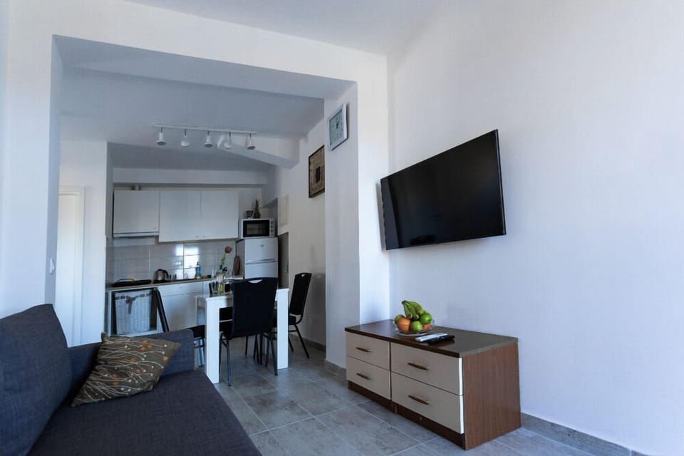 Apartment, Balcony, Sea View | Living area | Flat-screen TV
