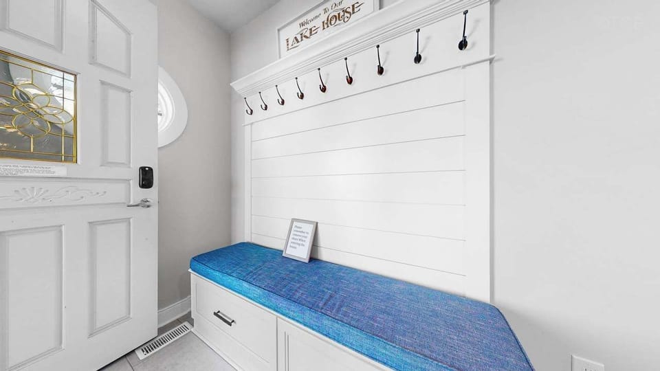 Bench and hooks at the front door for all your beach gear!