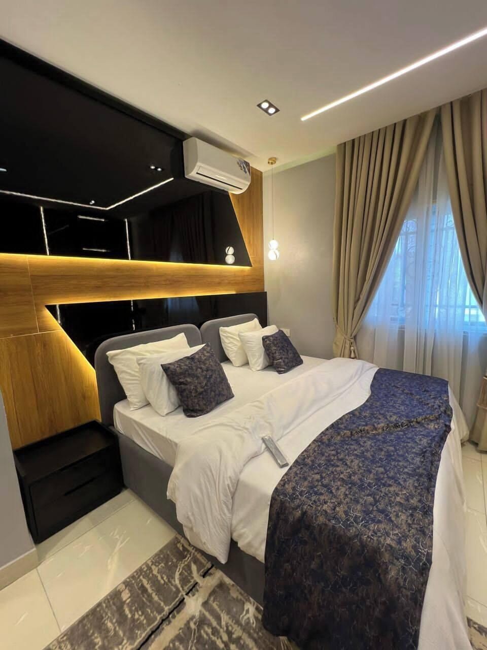 Deluxe Room, Balcony, City View | Desk, laptop workspace, blackout drapes, soundproofing