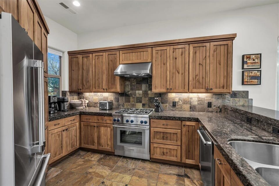 Kitchen with Granite Countertops & Thermador Appliances