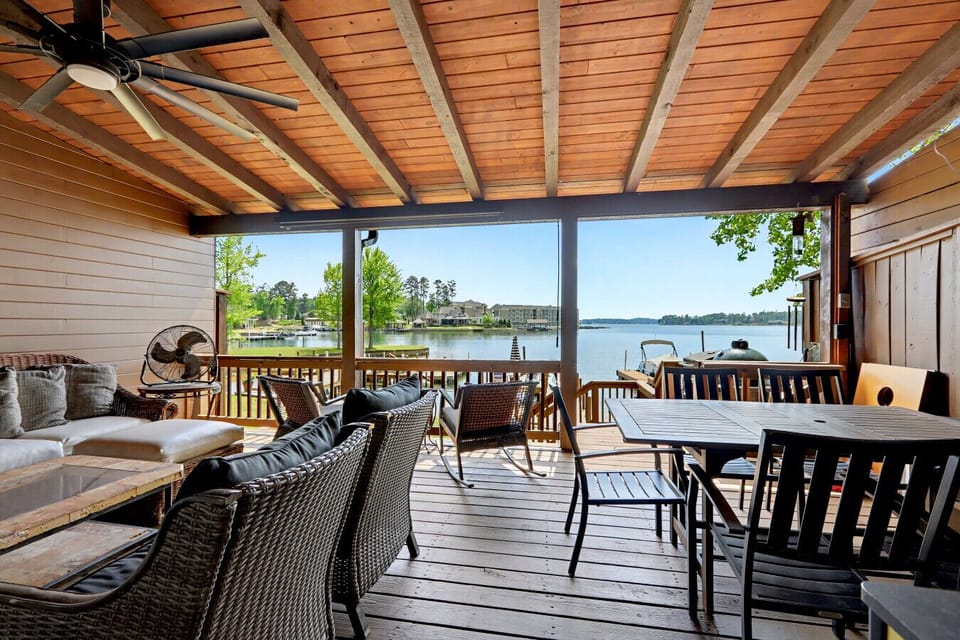 Spacious deck with stunning lake views, perfect for relaxing or outdoor dining.