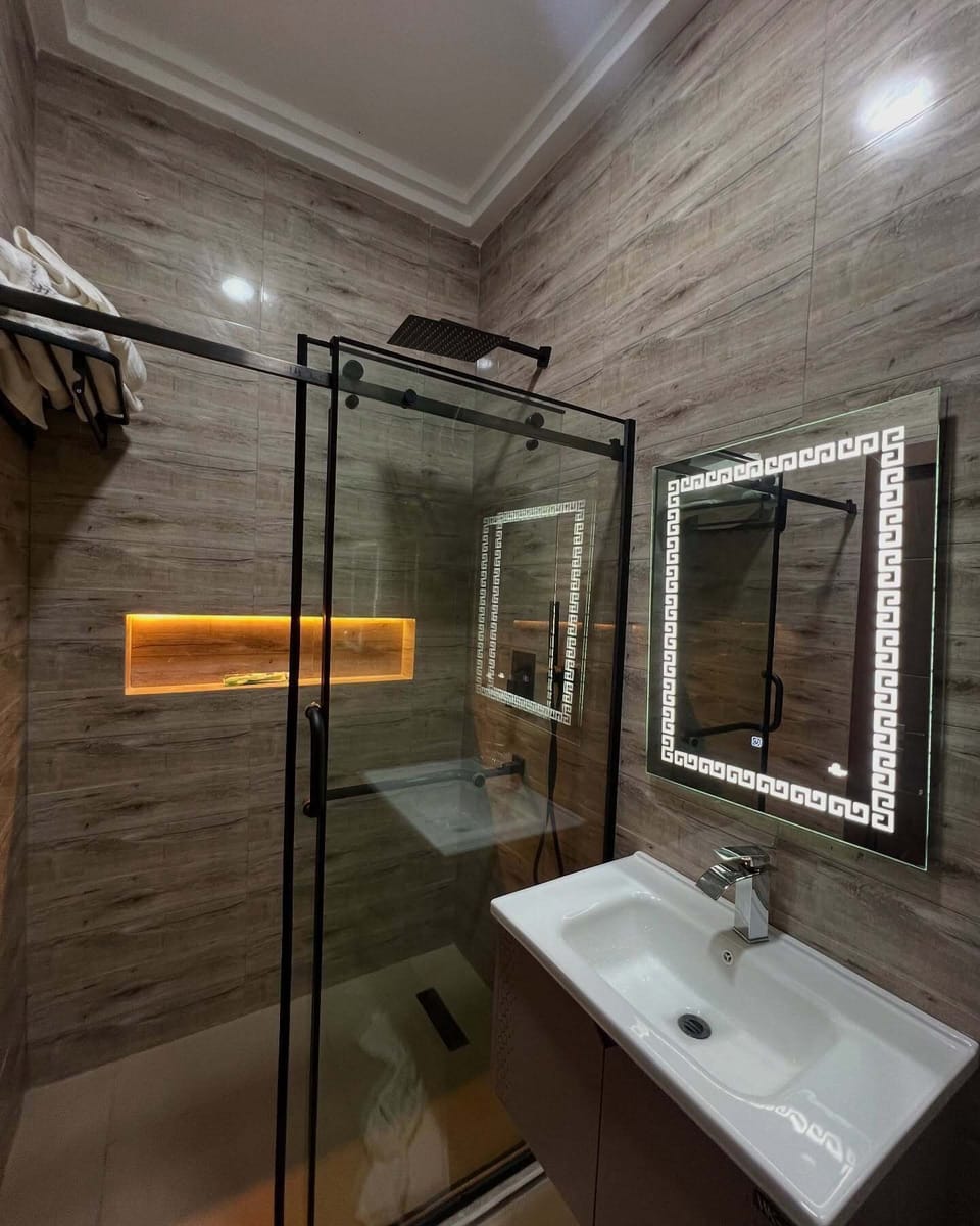 Family Room, Balcony, City View | Bathroom | Free toiletries, hair dryer, towels, soap
