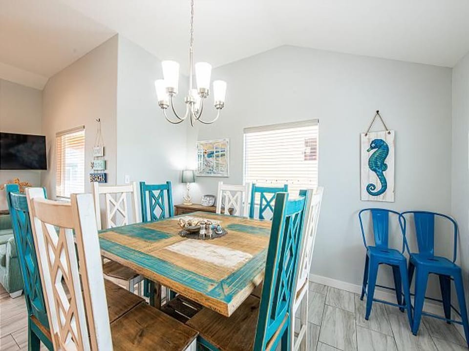 Always Beachin Port Aransas - Dining room table with 8 chairs &  2 extra chairs.