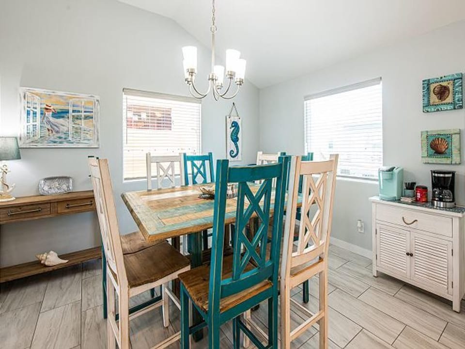 Always Beachin Port Aransas - Dining room table with 8 chairs &  2 extra chairs.
