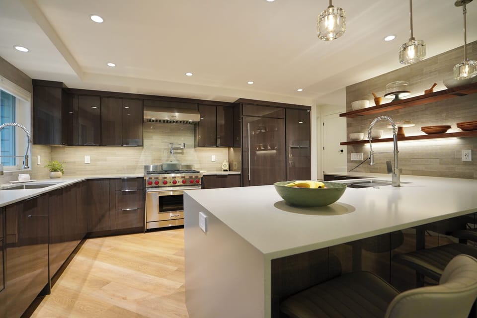 Gourmet kitchen with premium appliances and a generous waterfall island.